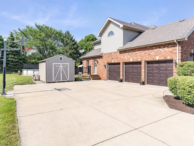 12114 W Castle Dr, Mokena, IL 60448 - view of home's exterior with brick siding, a storage unit, roof with shingles, driveway, and a garage