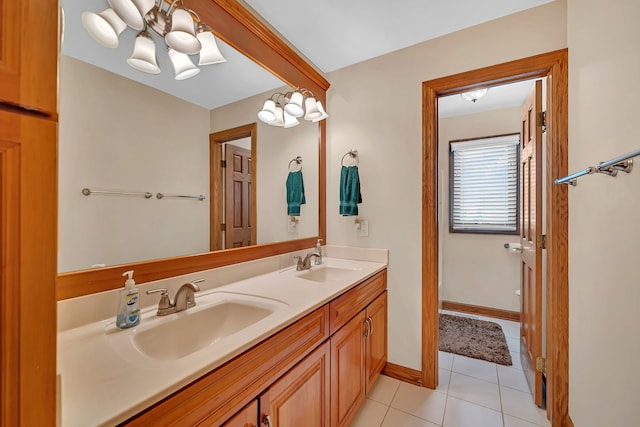 26645 W Ian Ct, Channahon, IL 60410 - full bath with a chandelier, double vanity, and tile patterned flooring