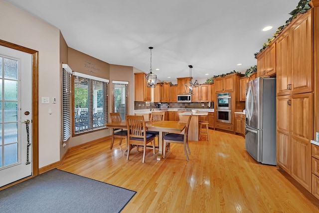 26645 W Ian Ct, Channahon, IL 60410 - dining area with light wood-style floors and recessed lighting
