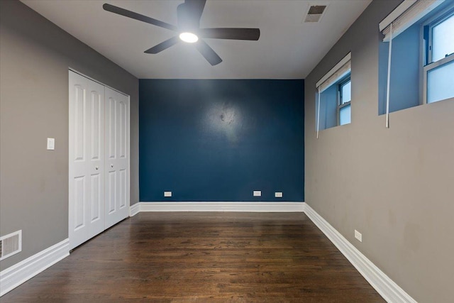 4351 S Forrestville Ave Unit G, Chicago, IL 60653 - unfurnished bedroom with wood finished floors, a closet, and a ceiling fan