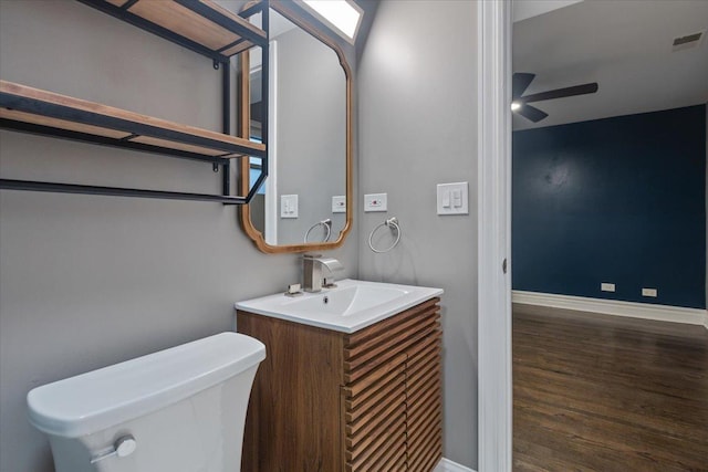 4351 S Forrestville Ave Unit G, Chicago, IL 60653 - bathroom with ceiling fan, vanity, and wood finished floors