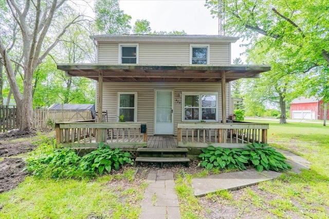 323 N 2nd Ave, Chenoa, IL 61726 - view of front of house featuring a wooden deck