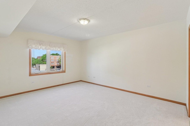 5005 Warren St Unit 403, Skokie, IL 60077 - empty room with light carpet and a textured ceiling