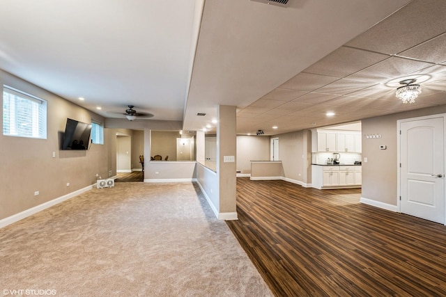21409 Foxtail Dr, Mokena, IL 60448 - unfurnished living room featuring recessed lighting and dark carpet