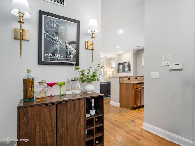 669 N Peoria St Unit 1N, Chicago, IL 60642 - hall with light wood-style flooring and recessed lighting