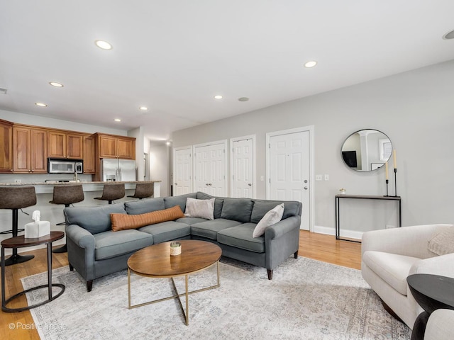 669 N Peoria St Unit 1N, Chicago, IL 60642 - living area with light wood-type flooring and recessed lighting