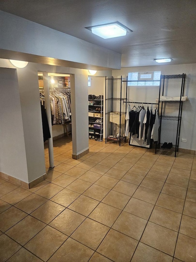 3401 S 56th Ct, Cicero, IL 60804 - basement featuring tile patterned floors and baseboards
