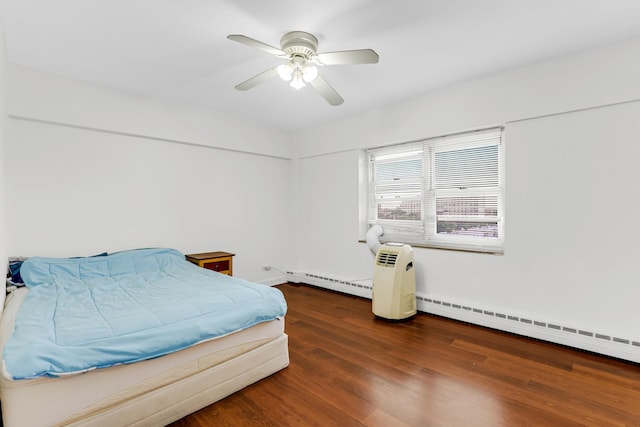 4970 N Marine Dr Unit 822, Chicago, IL 60640 - bedroom featuring a baseboard heating unit, wood finished floors, and ceiling fan