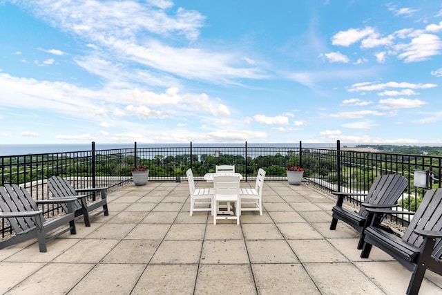 4970 N Marine Dr Unit 822, Chicago, IL 60640 - view of patio / terrace featuring a water view and outdoor dining space