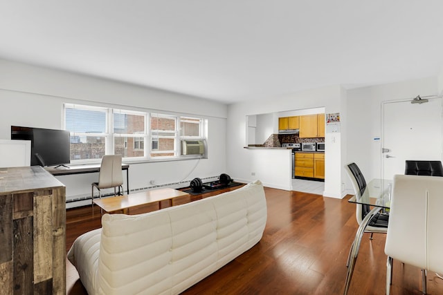 4970 N Marine Dr Unit 822, Chicago, IL 60640 - living area with dark wood-type flooring, an office area, cooling unit, and a baseboard heating unit