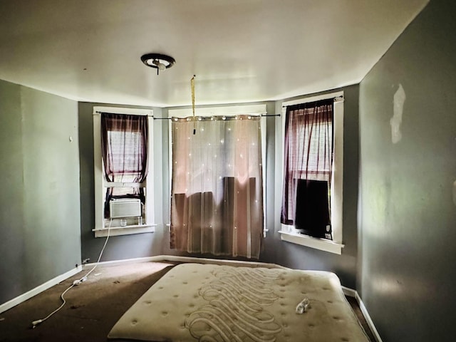 722 Lenox Ave, Waukegan, IL 60085 - unfurnished bedroom featuring baseboards and cooling unit
