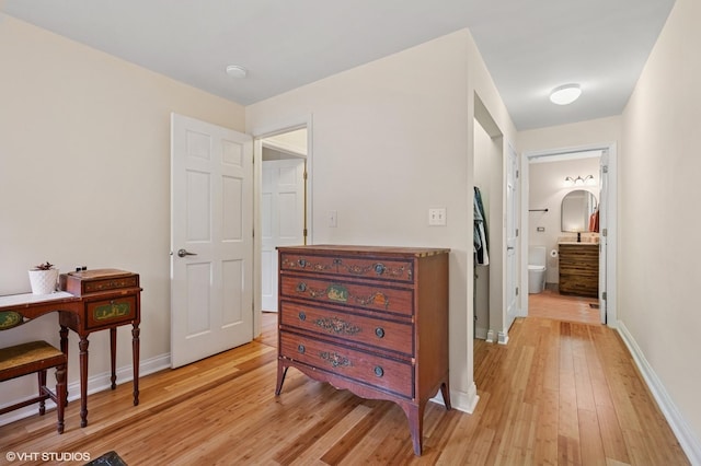 2417 Lyons St, Evanston, IL 60201 - corridor with light wood-style flooring and baseboards