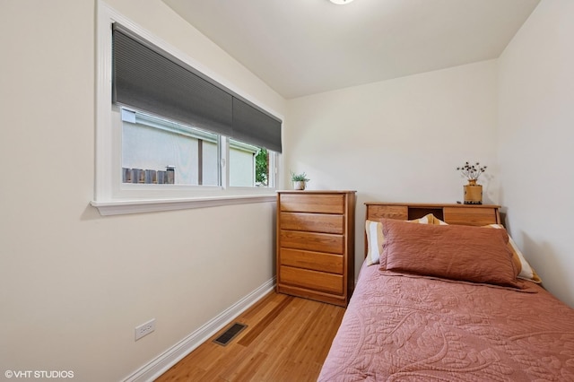 2417 Lyons St, Evanston, IL 60201 - bedroom featuring light wood-style flooring and baseboards