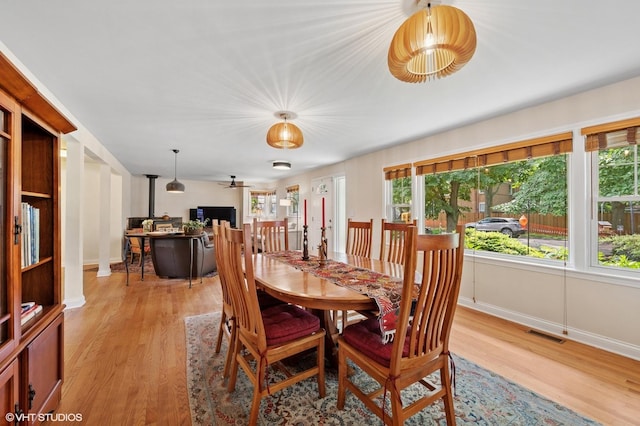 2417 Lyons St, Evanston, IL 60201 - dining space featuring light wood-style floors and plenty of natural light