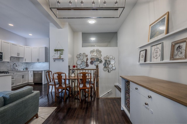 1349 W Huron St Unit 1, Chicago, IL 60642 - dining area with dark wood-style floors and baseboards