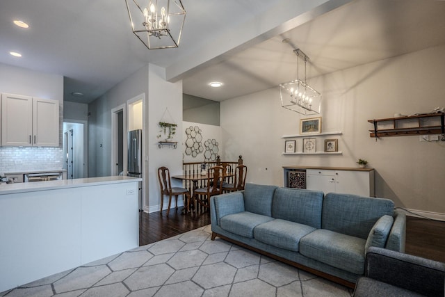 1349 W Huron St Unit 1, Chicago, IL 60642 - living room with wood finished floors, recessed lighting, wine cooler, and a chandelier