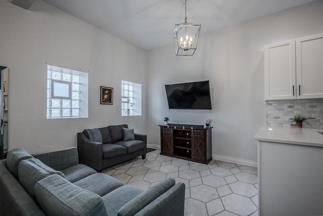 1349 W Huron St Unit 1, Chicago, IL 60642 - living area with a chandelier and baseboards