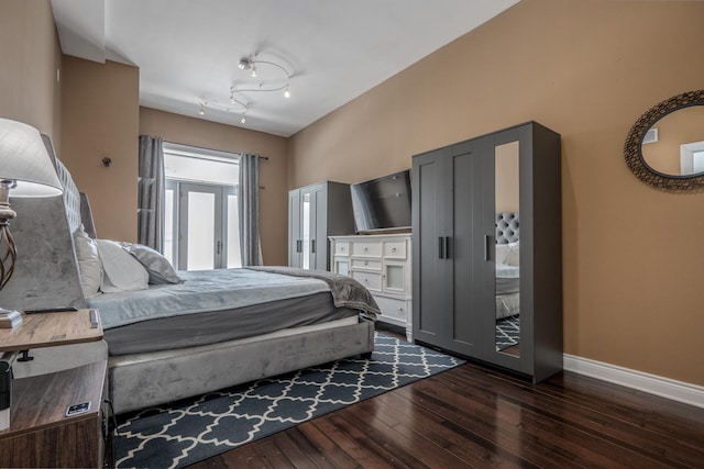 1349 W Huron St Unit 1, Chicago, IL 60642 - bedroom with dark wood-style floors and baseboards