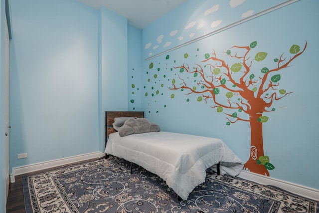 1349 W Huron St Unit 1, Chicago, IL 60642 - bedroom with baseboards and wood finished floors