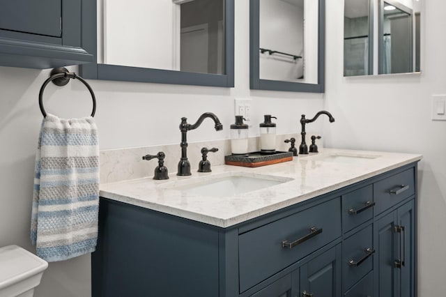 819 Stowell Ave, Streamwood, IL 60107 - bathroom featuring double vanity and toilet