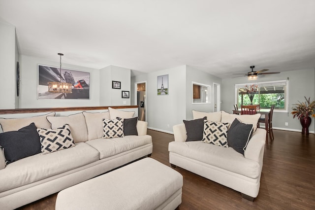 819 Stowell Ave, Streamwood, IL 60107 - living room with dark wood-type flooring, a chandelier, and a ceiling fan