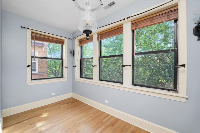 7633 N Greenview Ave Unit 3W, Chicago, IL 60626 - spare room featuring baseboards and wood finished floors