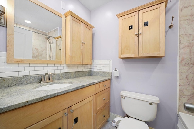 7633 N Greenview Ave Unit 3W, Chicago, IL 60626 - bathroom featuring vanity and tasteful backsplash