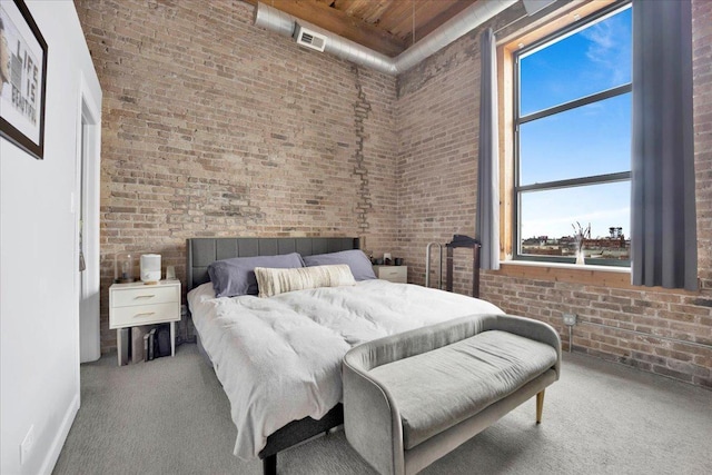 1801 S Michigan Ave Unit 701, Chicago, IL 60616 - carpeted bedroom with brick wall, a high ceiling, and wooden ceiling