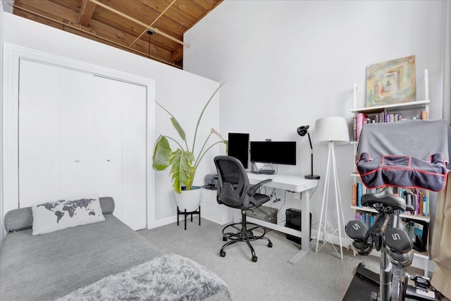 1801 S Michigan Ave Unit 701, Chicago, IL 60616 - carpeted bedroom with a wooden ceiling with exposed beams, an office area, a closet, and high vaulted ceiling