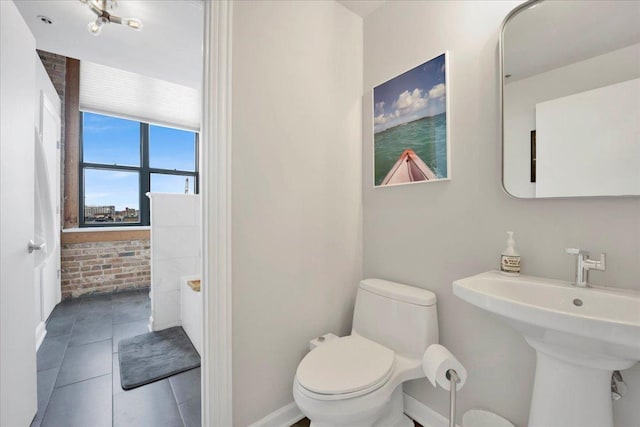 1801 S Michigan Ave Unit 701, Chicago, IL 60616 - bathroom with toilet and tile patterned floors
