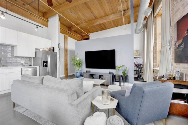 1801 S Michigan Ave Unit 701, Chicago, IL 60616 - living room with a wooden ceiling with exposed beams, ceiling fan, and wood finished floors