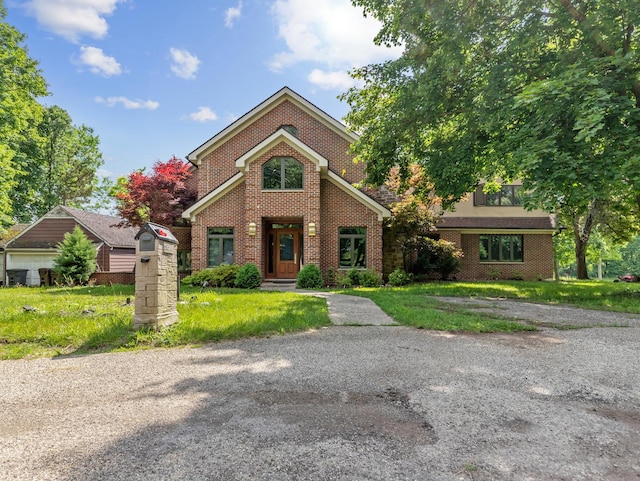 1313 Plum Tree Rd, Barrington Hills, IL 60010 - traditional-style home featuring brick siding and a front lawn