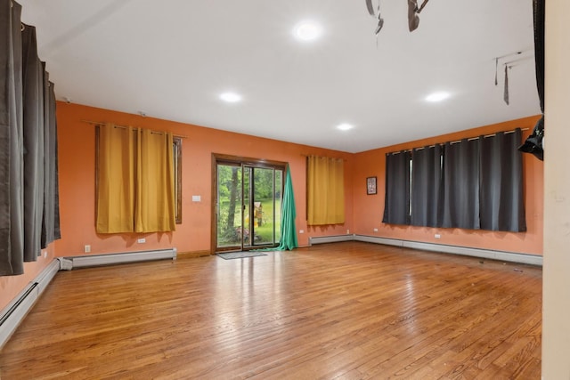 1313 Plum Tree Rd, Barrington Hills, IL 60010 - unfurnished living room with light wood-style floors, a baseboard heating unit, and recessed lighting