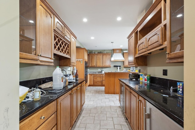1313 Plum Tree Rd, Barrington Hills, IL 60010 - kitchen with stone tile floors, premium range hood, brown cabinetry, glass insert cabinets, and recessed lighting