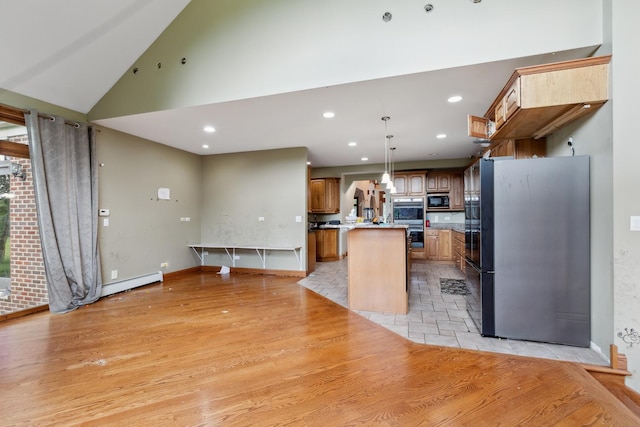 1313 Plum Tree Rd, Barrington Hills, IL 60010 - kitchen with stainless steel appliances, a center island, recessed lighting, light wood-style floors, and a baseboard radiator