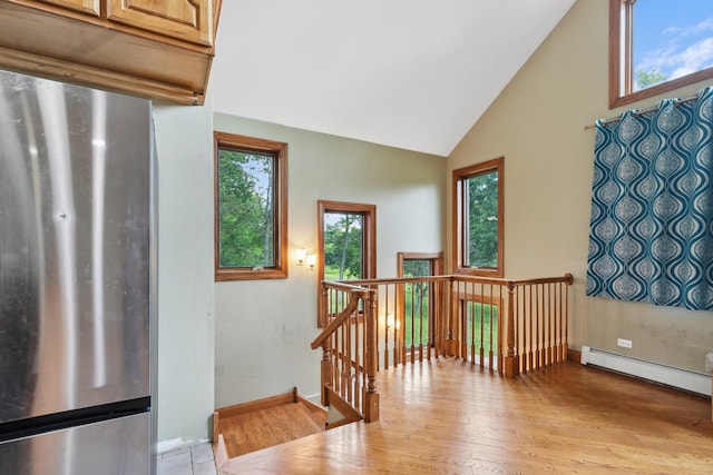 1313 Plum Tree Rd, Barrington Hills, IL 60010 - entryway with light wood-style flooring, high vaulted ceiling, and baseboard heating