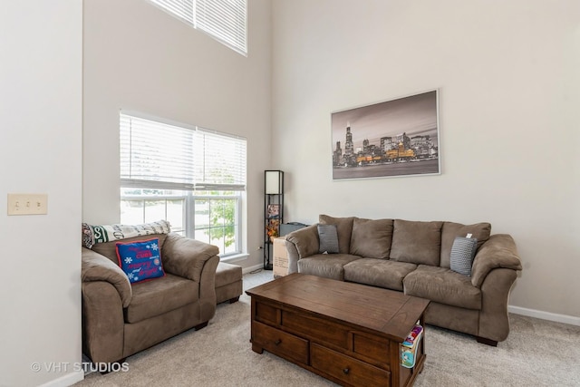 1811 Prairie Ridge Dr, Plainfield, IL 60586 - living area with carpet floors and a towering ceiling