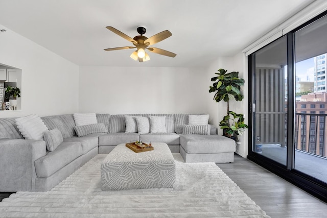 10 E Ontario St Unit 907, Chicago, IL 60611 - living area featuring wood finished floors and a ceiling fan