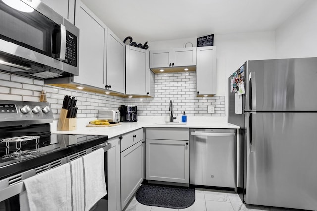 10 E Ontario St Unit 907, Chicago, IL 60611 - kitchen with appliances with stainless steel finishes, light countertops, and decorative backsplash