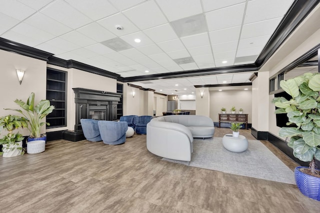 10 E Ontario St Unit 907, Chicago, IL 60611 - living area with wood finished floors, crown molding, a glass covered fireplace, and recessed lighting