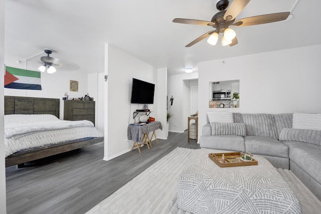 10 E Ontario St Unit 907, Chicago, IL 60611 - living room with a ceiling fan and wood finished floors