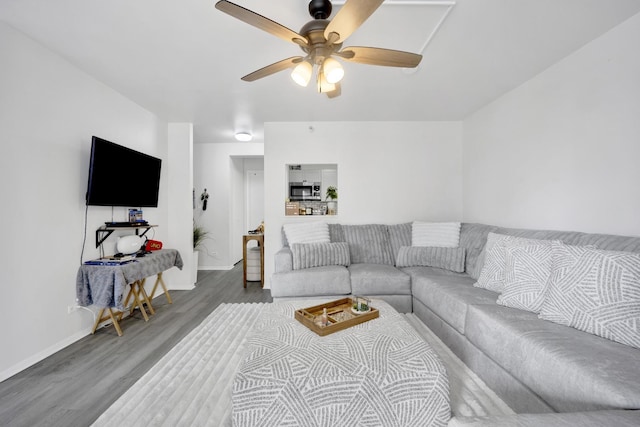 10 E Ontario St Unit 907, Chicago, IL 60611 - living room with wood finished floors and ceiling fan