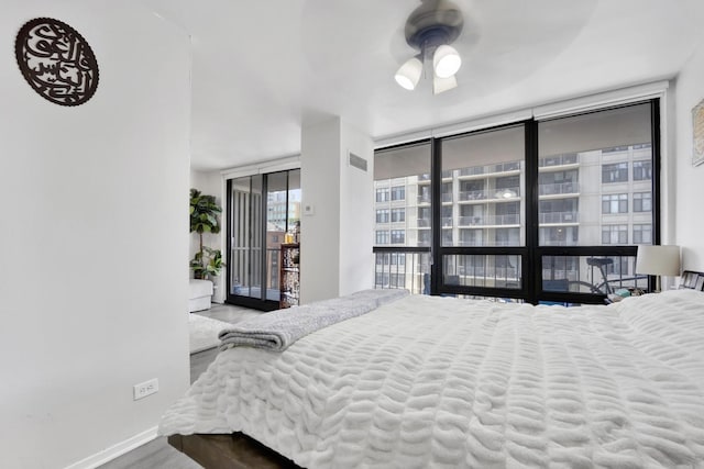 10 E Ontario St Unit 907, Chicago, IL 60611 - bedroom featuring a wall of windows and access to exterior