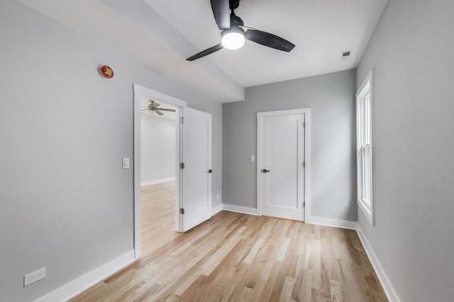 5735 S Fairfield Ave, Chicago, IL 60629 - unfurnished bedroom featuring light wood finished floors and a ceiling fan