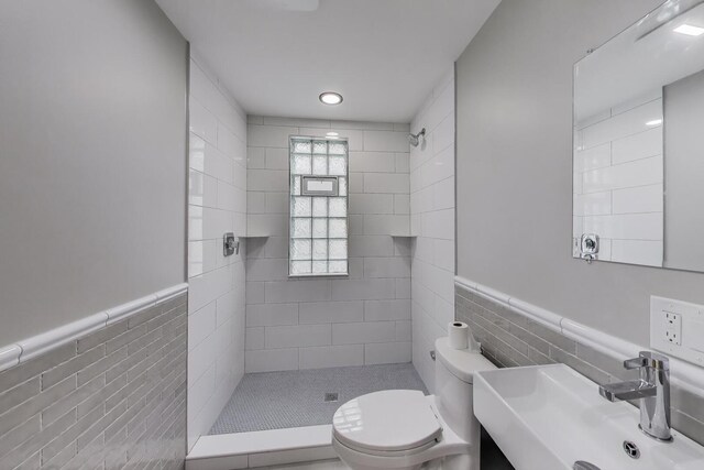 5735 S Fairfield Ave, Chicago, IL 60629 - full bath with tile walls, a shower stall, and a wainscoted wall