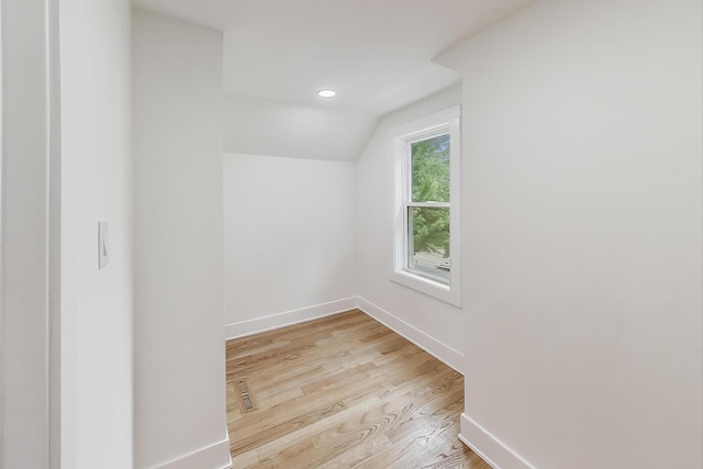 5735 S Fairfield Ave, Chicago, IL 60629 - additional living space with light wood-style flooring, vaulted ceiling, and recessed lighting