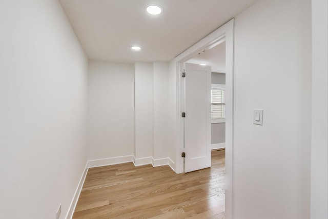 5735 S Fairfield Ave, Chicago, IL 60629 - corridor with light wood finished floors and recessed lighting