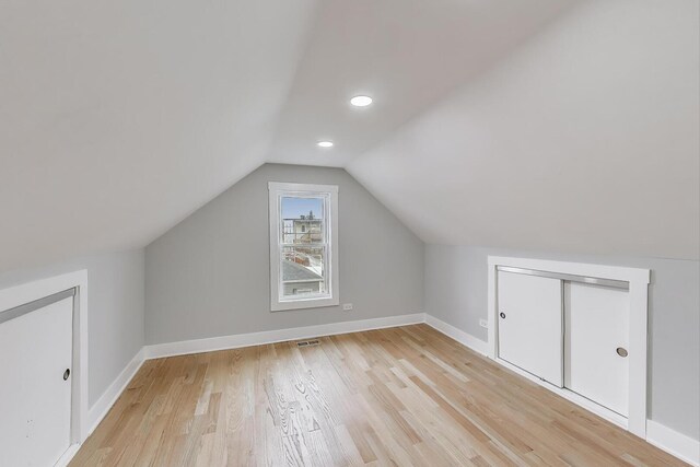 5735 S Fairfield Ave, Chicago, IL 60629 - additional living space with lofted ceiling, light wood-style floors, and recessed lighting
