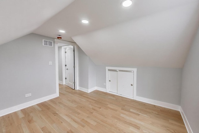 5735 S Fairfield Ave, Chicago, IL 60629 - additional living space with lofted ceiling, light wood-style floors, and recessed lighting