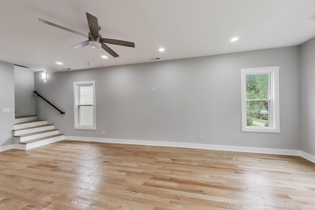 5735 S Fairfield Ave, Chicago, IL 60629 - spare room with plenty of natural light, light wood finished floors, stairs, recessed lighting, and ceiling fan